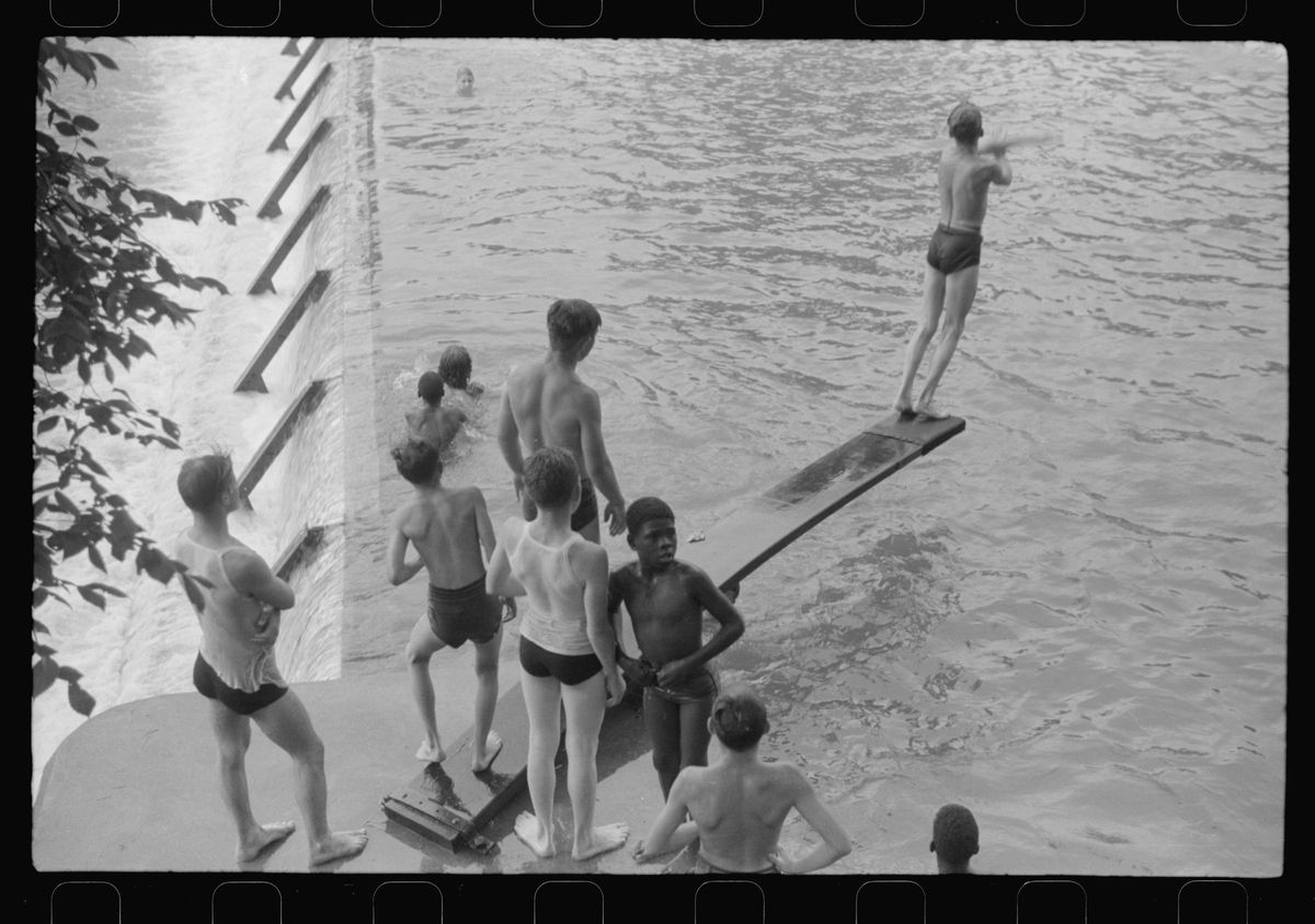 A swimming pool created by a CCC dam, captioned Huntingdon, Pennsylvania, July 1941, Farm Security Administration photograph.