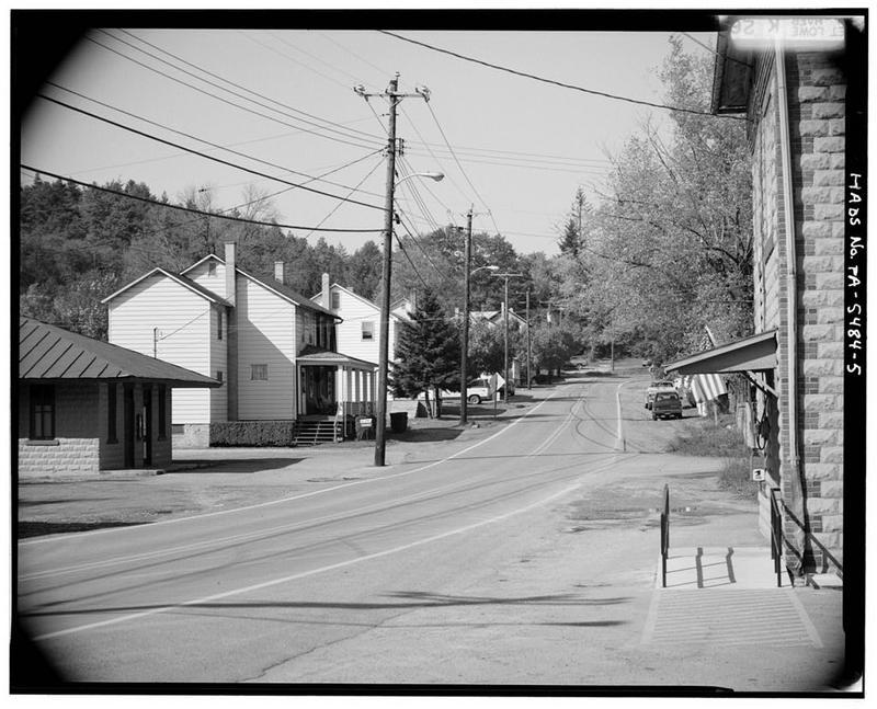 Looking north along Main Street in Robertsdale, with the East Broad Top depot at left and the Rockhill Iron and Coal Company office and post office at right